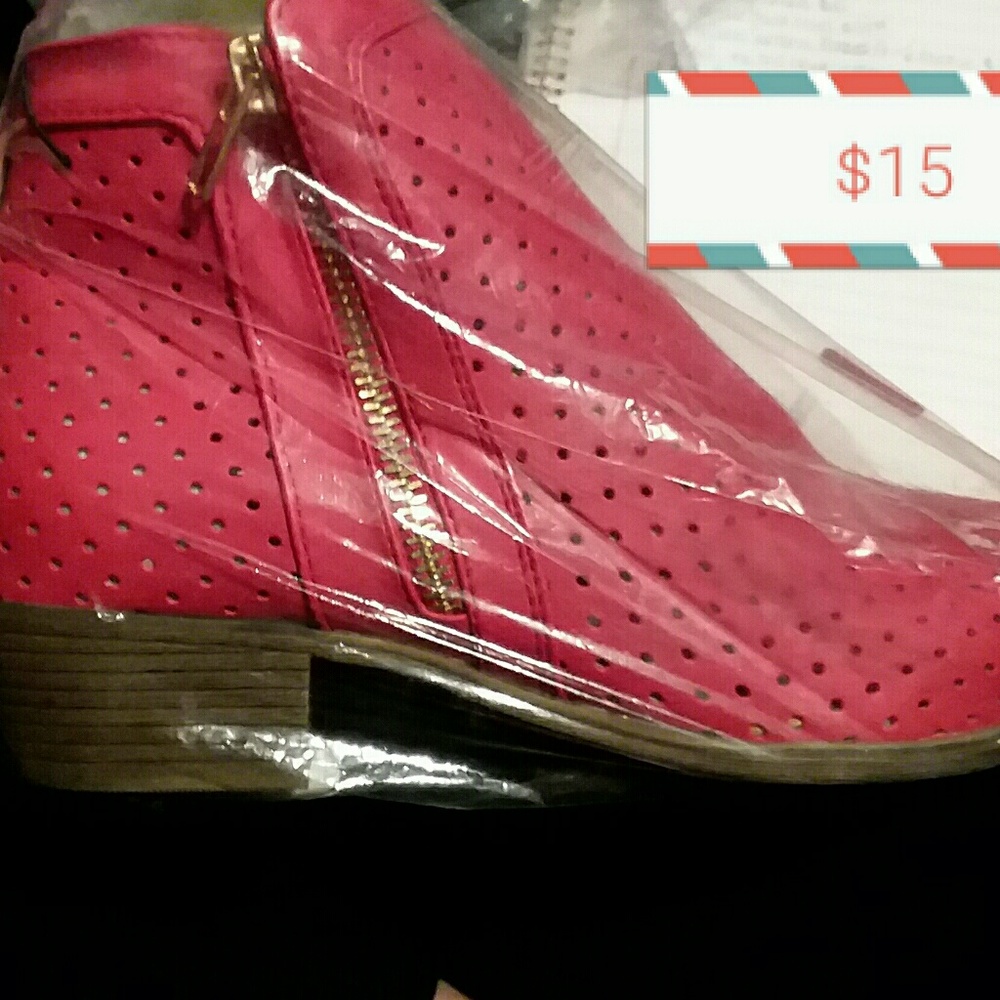 Red perforated booties